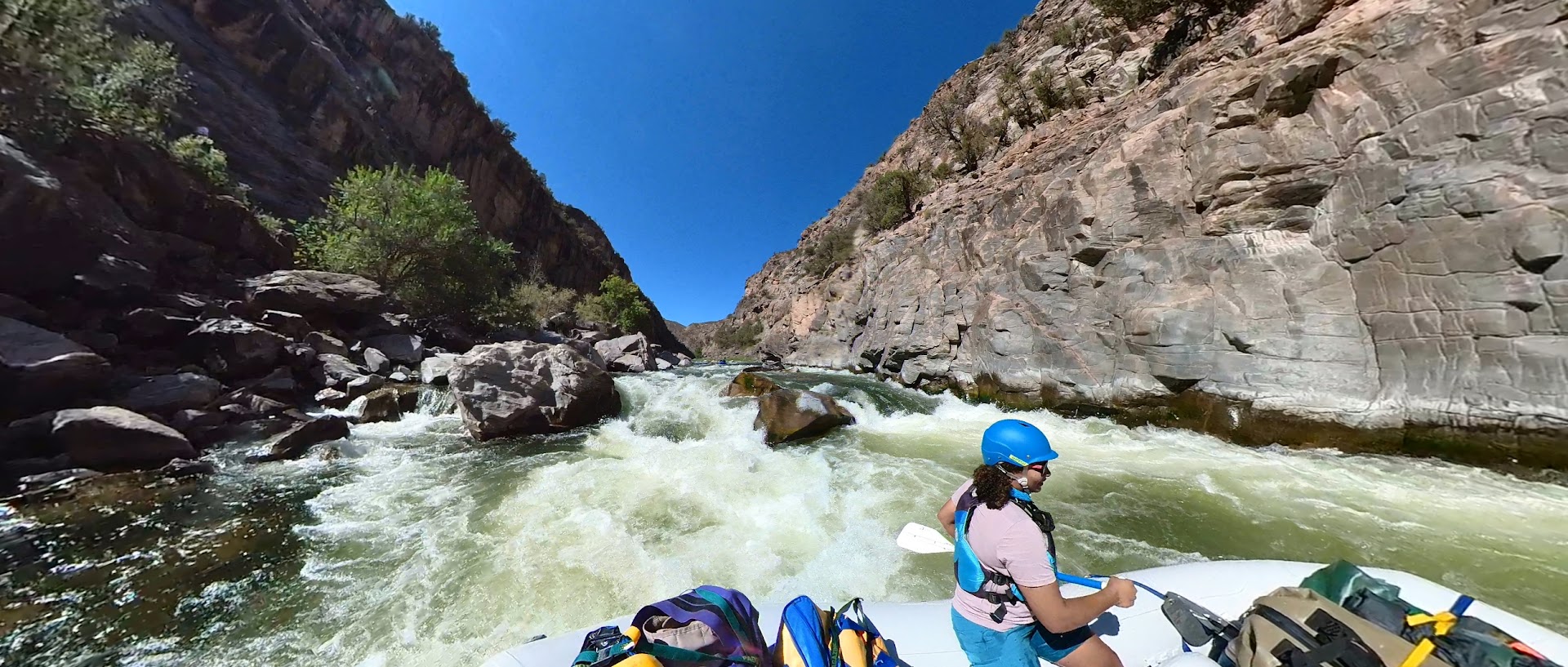 A picture of Amanda paddling at the bottom of cable
