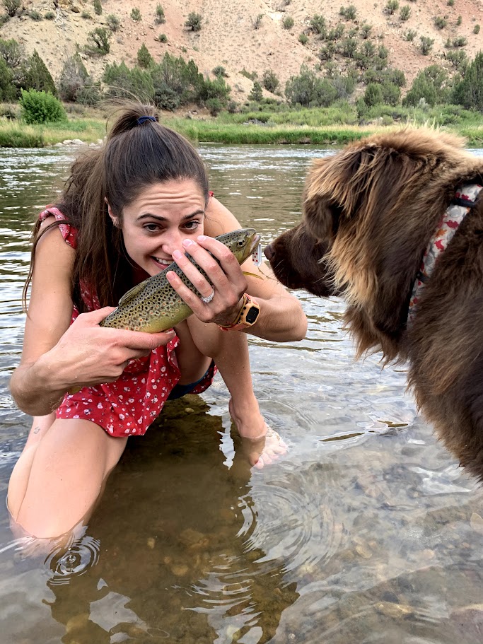 A picture of Hannah with a rainbow trout