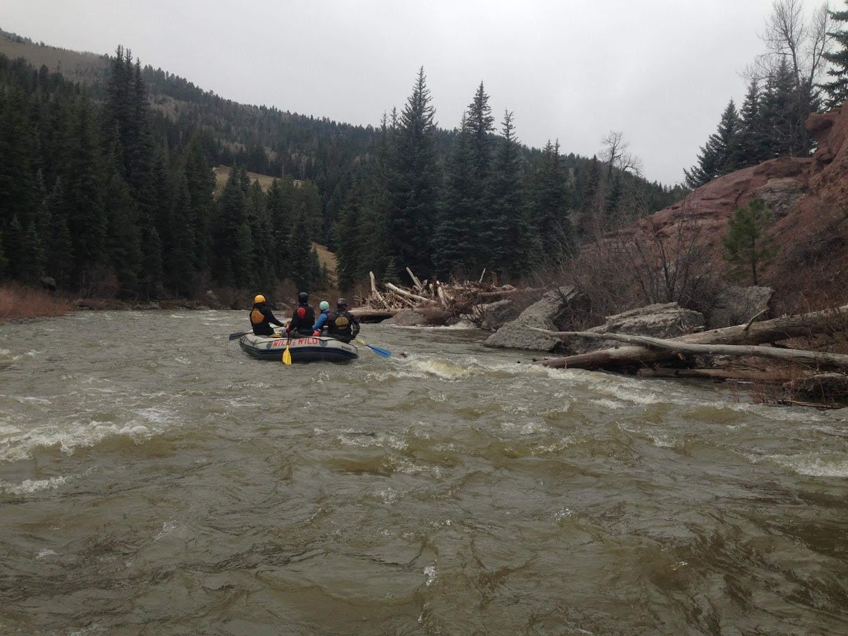 A raft on the water in the Upper Box of the Piedra