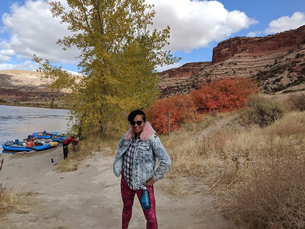 A picture of Amanda in a high collar jacket