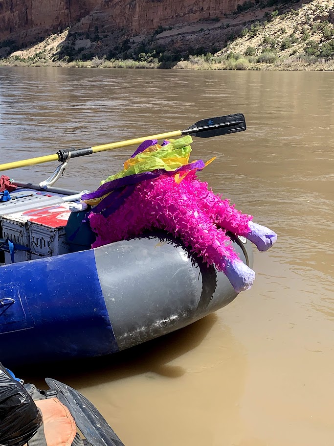 A picture the pinata face down in the raft