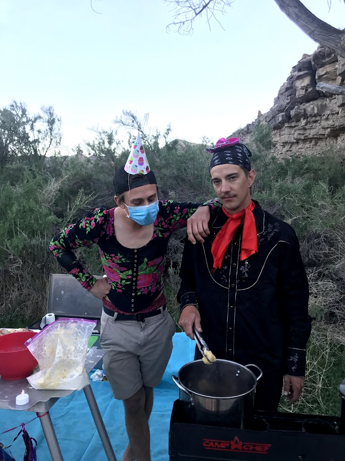 A picture of Wade and Elliot preparing dinner
