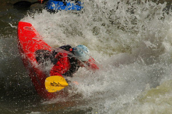 Kayaker throwing a trip in Smelter Rapid